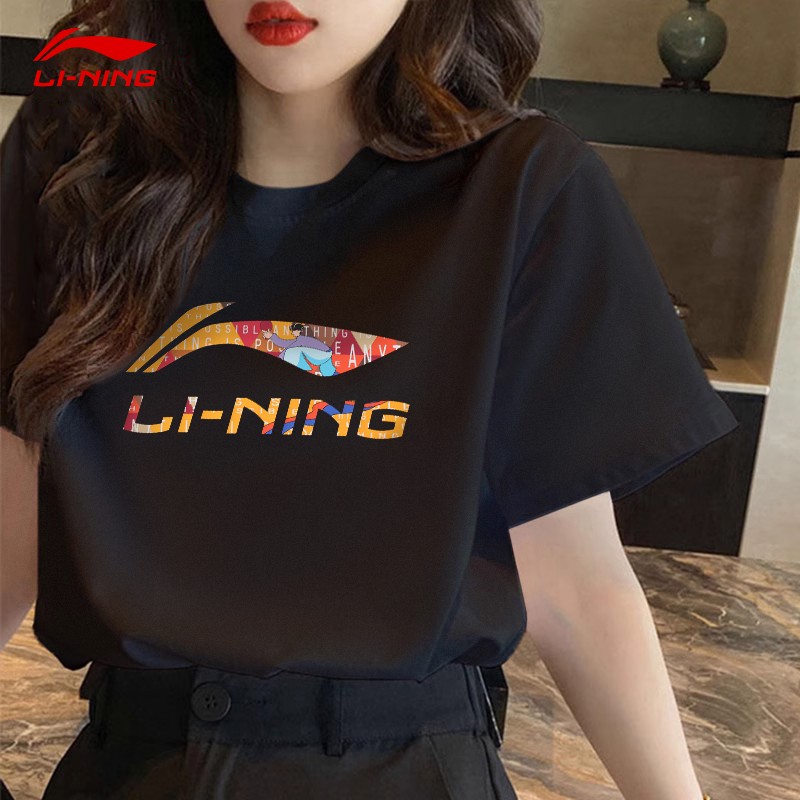 Li Ning Short -sleeved T -shirt Ms. Summer New Loose Loose Leisure Leisure Sports Half -sleeve Tie